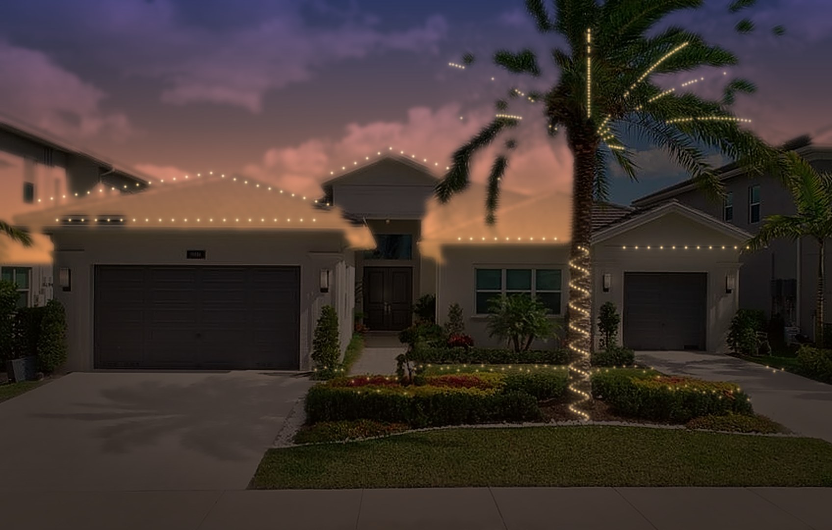 Same house lit at night